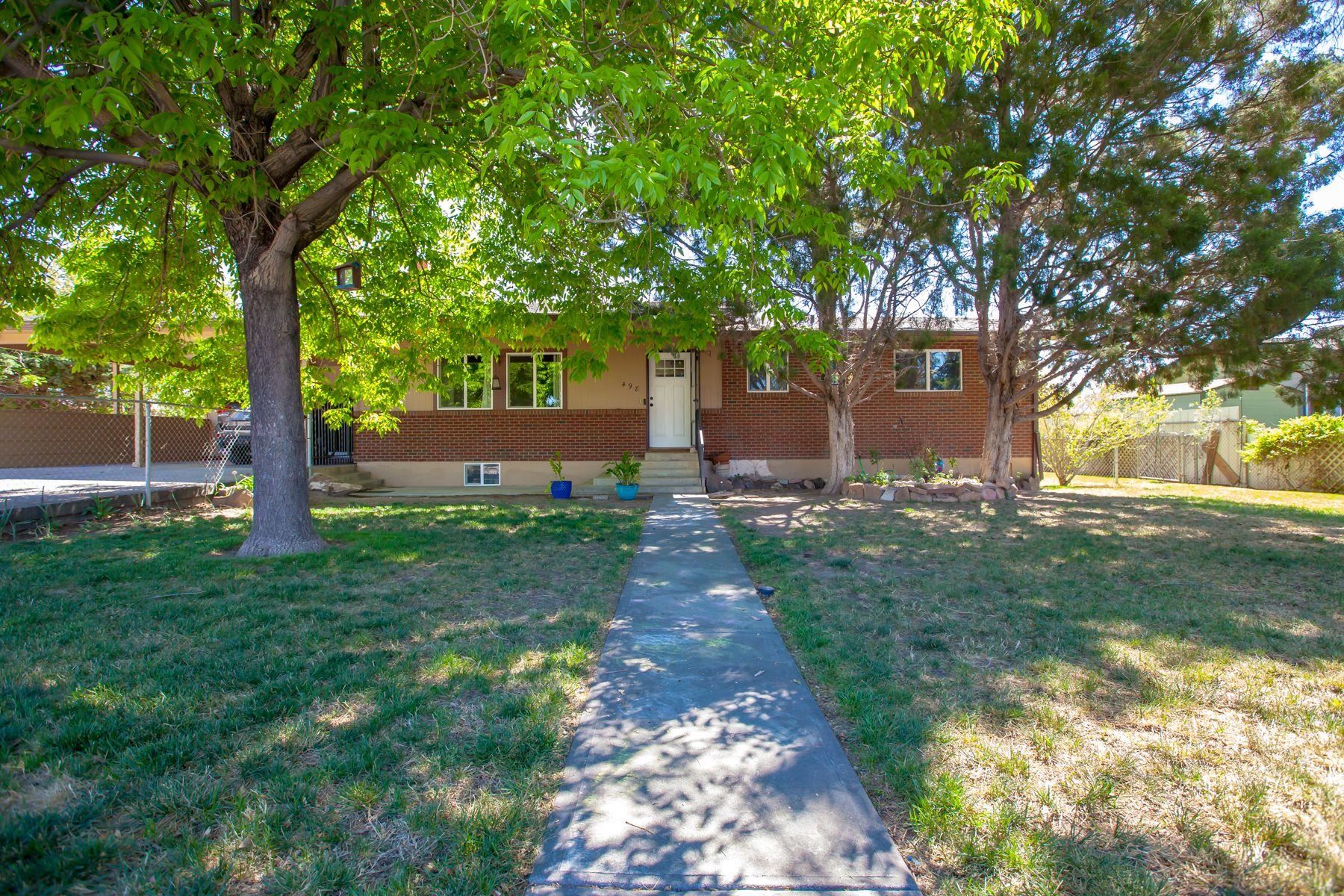 498 Sheldon Road Grand Junction, CO 81504 - Photo 2 of 42 a front view of a house with garden