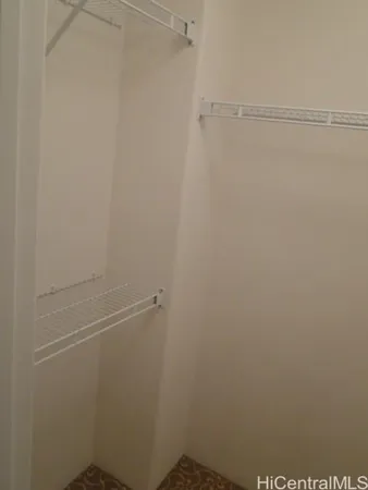 a view of small space with racks on the wall