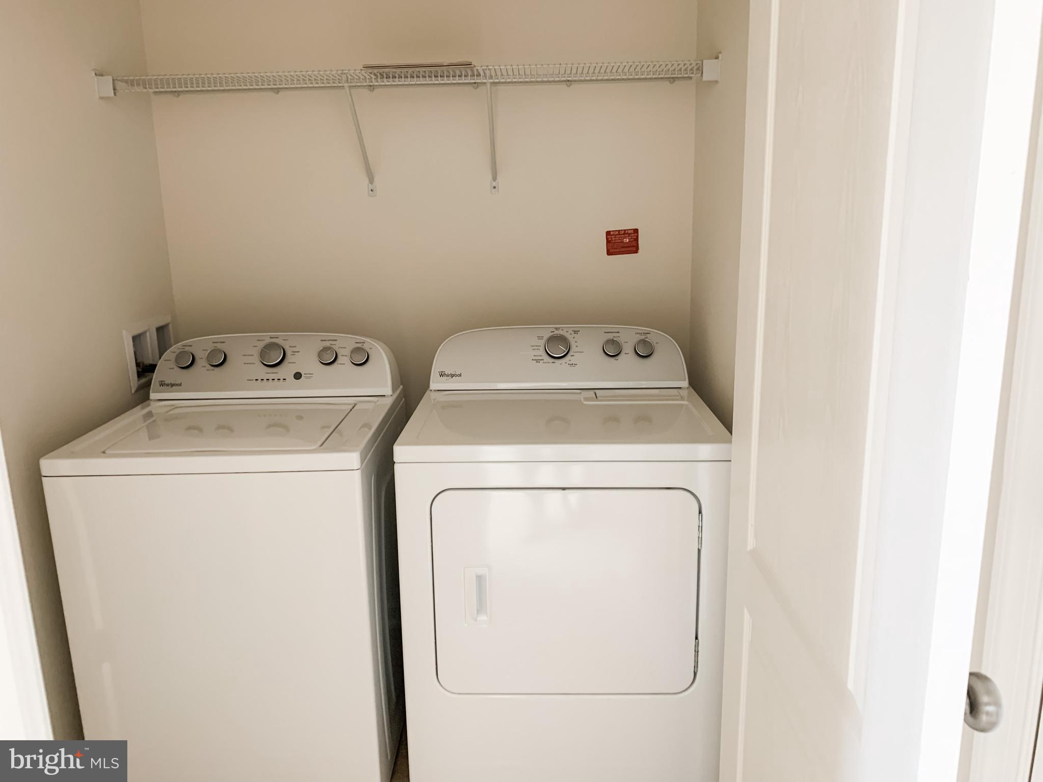 43322 Novi Terrace Ashburn, VA 20147 - Photo 15 of 19 a utility room with dryer and washer