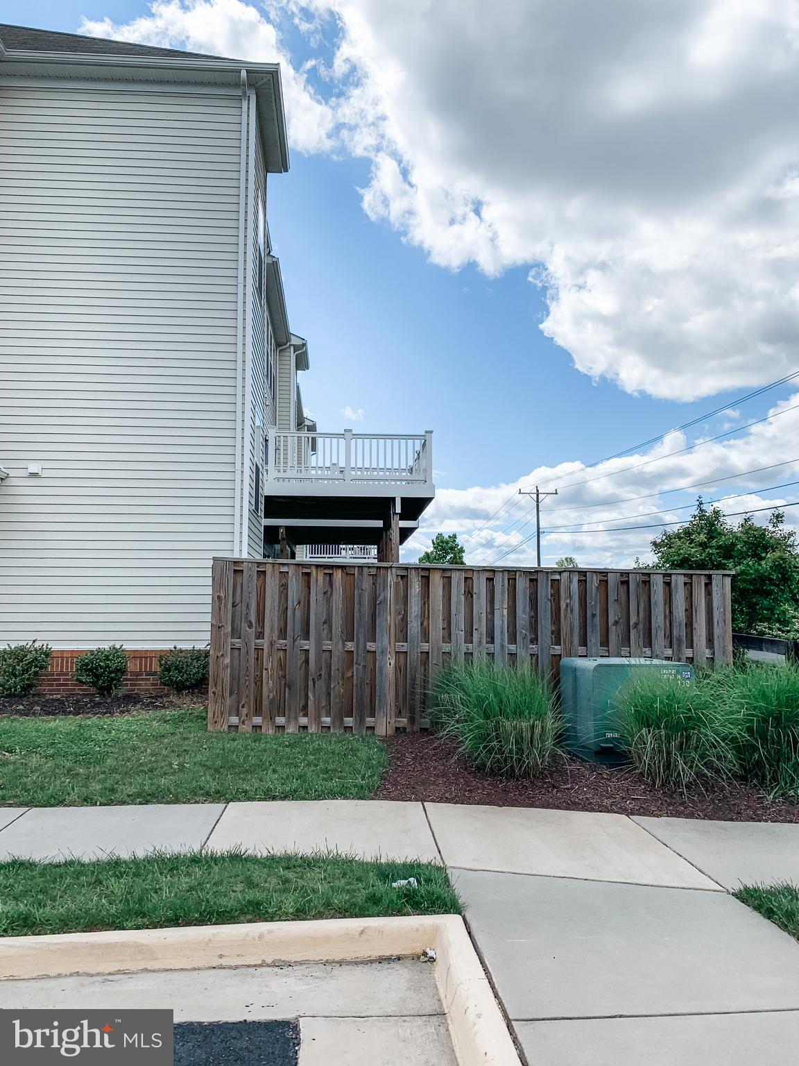 43322 Novi Terrace Ashburn, VA 20147 - Photo 3 of 19 a view of a yard in front of a house with a yard