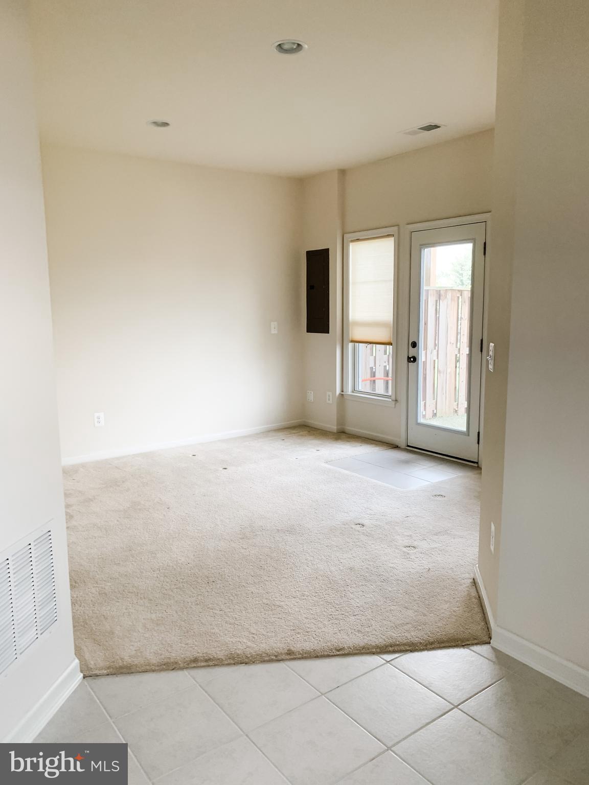 43322 Novi Terrace Ashburn, VA 20147 - Photo 5 of 19 a view of an empty room with a window