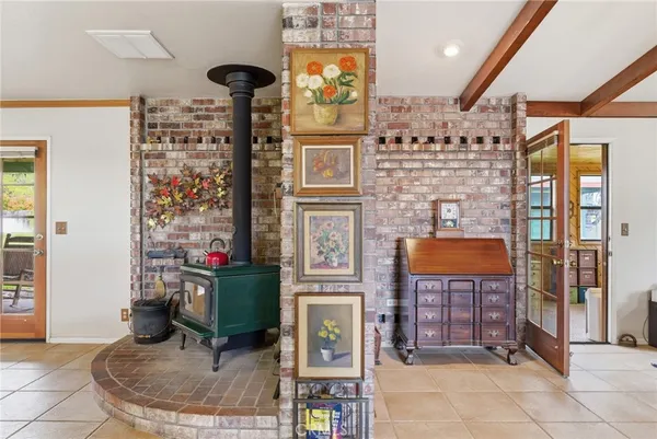 a kitchen with a sink and large window