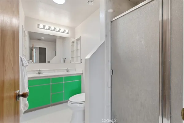 a view of a patio with a table chairs and a backyard