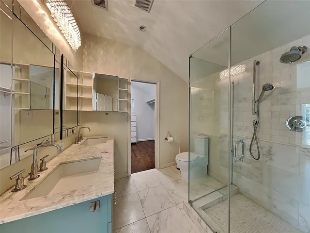 a bathroom with a sink and mirror