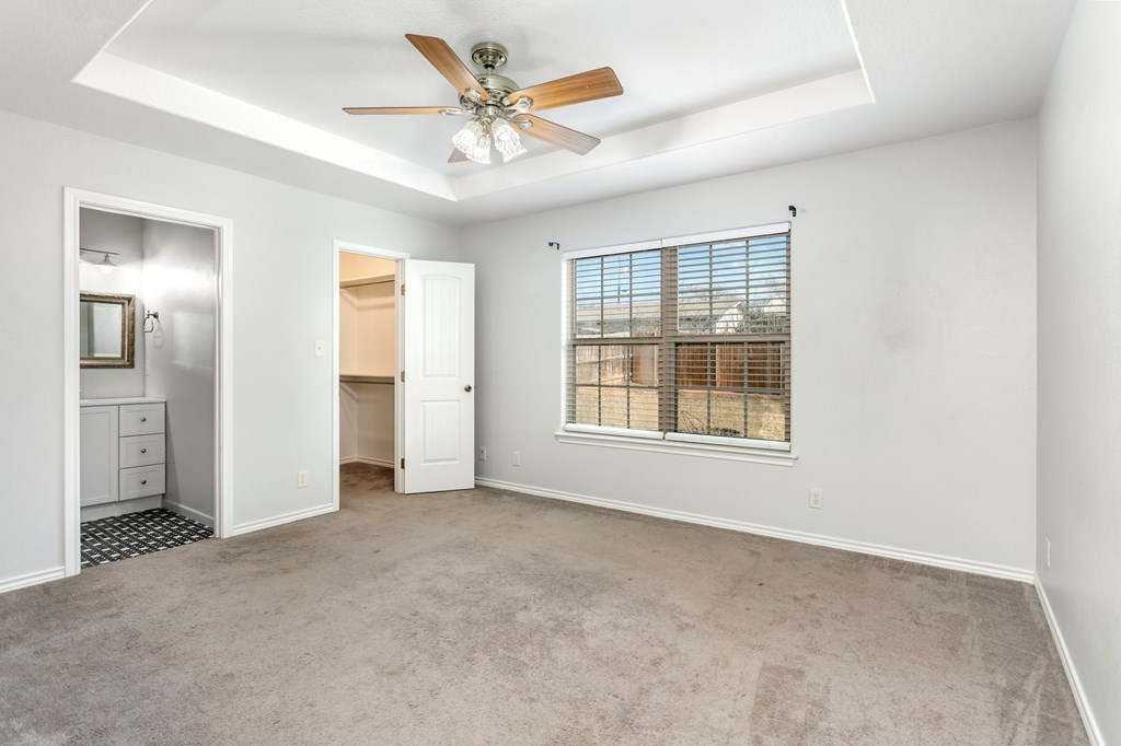 211 Green Oaks Loop Fredericksburg, TX 78624 - Photo 9 of 22 a view of an empty room with a window