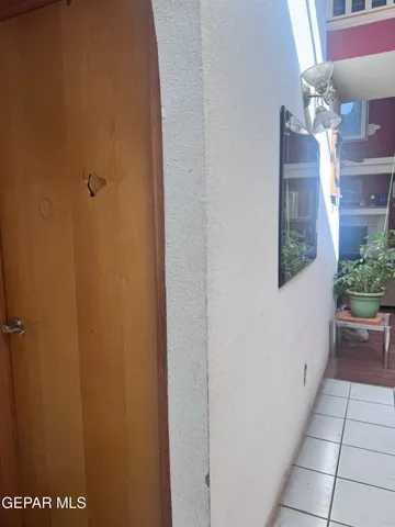 a bathroom with a toilet and shower