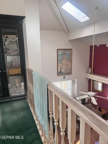 a view of a balcony with table and chairs