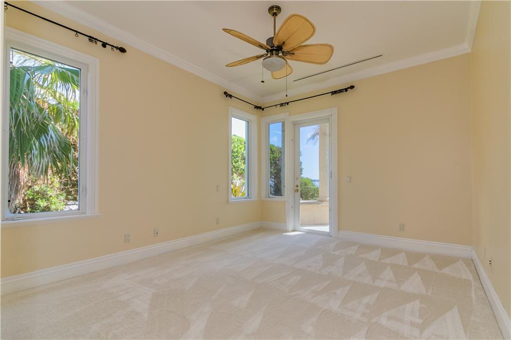 18 Island Road Stuart, FL 34996 - Photo 52 of 58 Guest Bedroom located on Waterfront with Door leading Directly to Pool Patio / Outdoor Living Areas