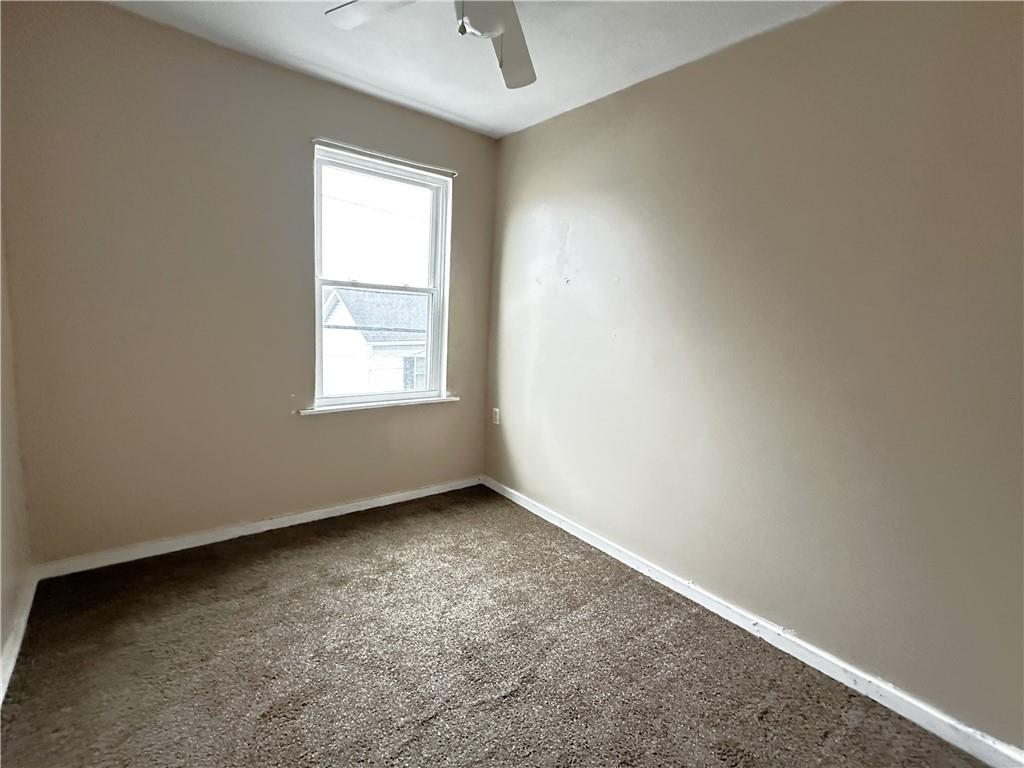 259 High Street Mount Pleasant, PA 15666 - Photo 14 of 19 an empty room with a window