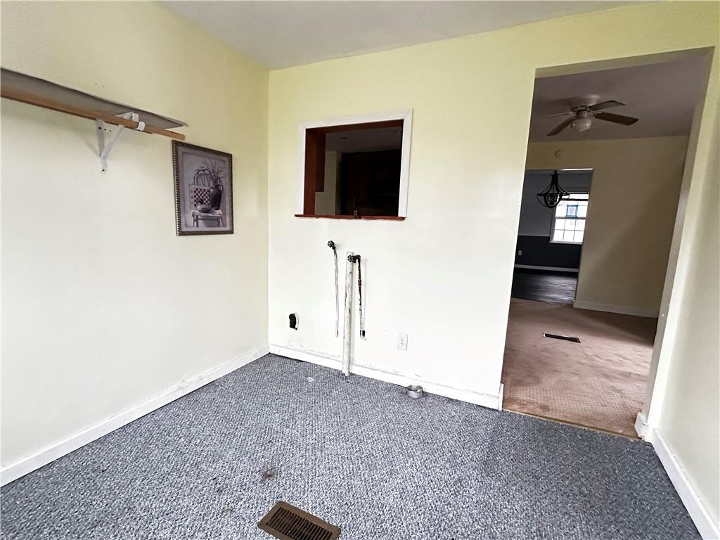 259 High Street Mount Pleasant, PA 15666 - Photo 9 of 19 a view of a livingroom with wooden floor and windows