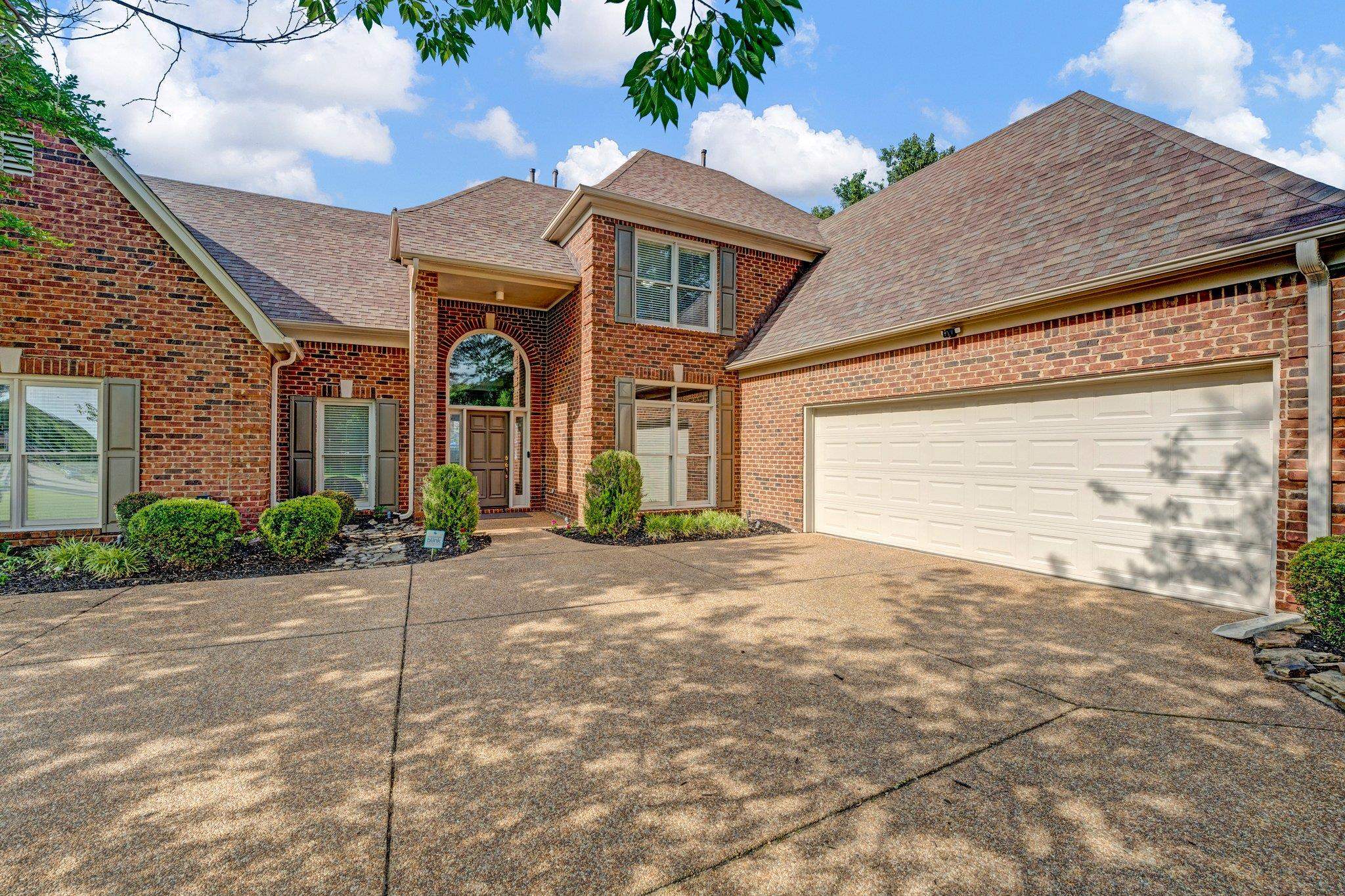 1331 Riding Brook Drive Collierville, TN 38017 - Photo 1 of 39 View of property featuring a garage