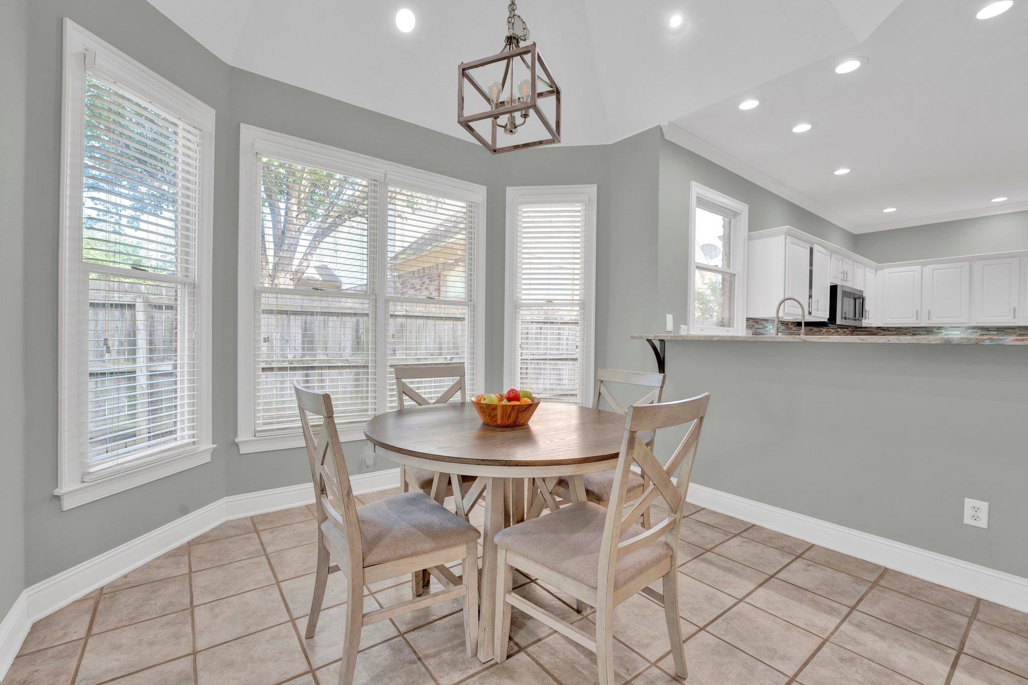 1331 Riding Brook Drive Collierville, TN 38017 - Photo 13 of 39 Dining area with sink and light tile patterned floors