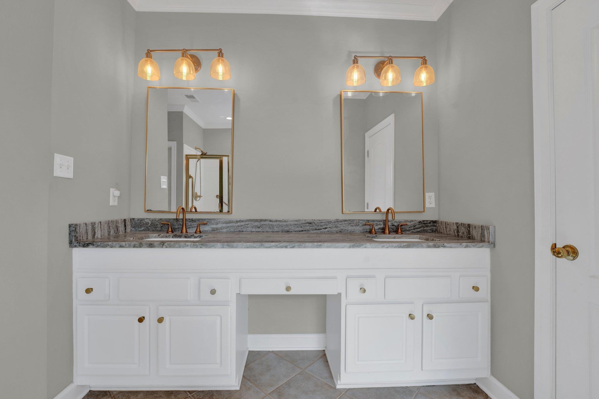 1331 Riding Brook Drive Collierville, TN 38017 - Photo 21 of 39 Bathroom featuring dual vanity, ornamental molding, and tile patterned floors