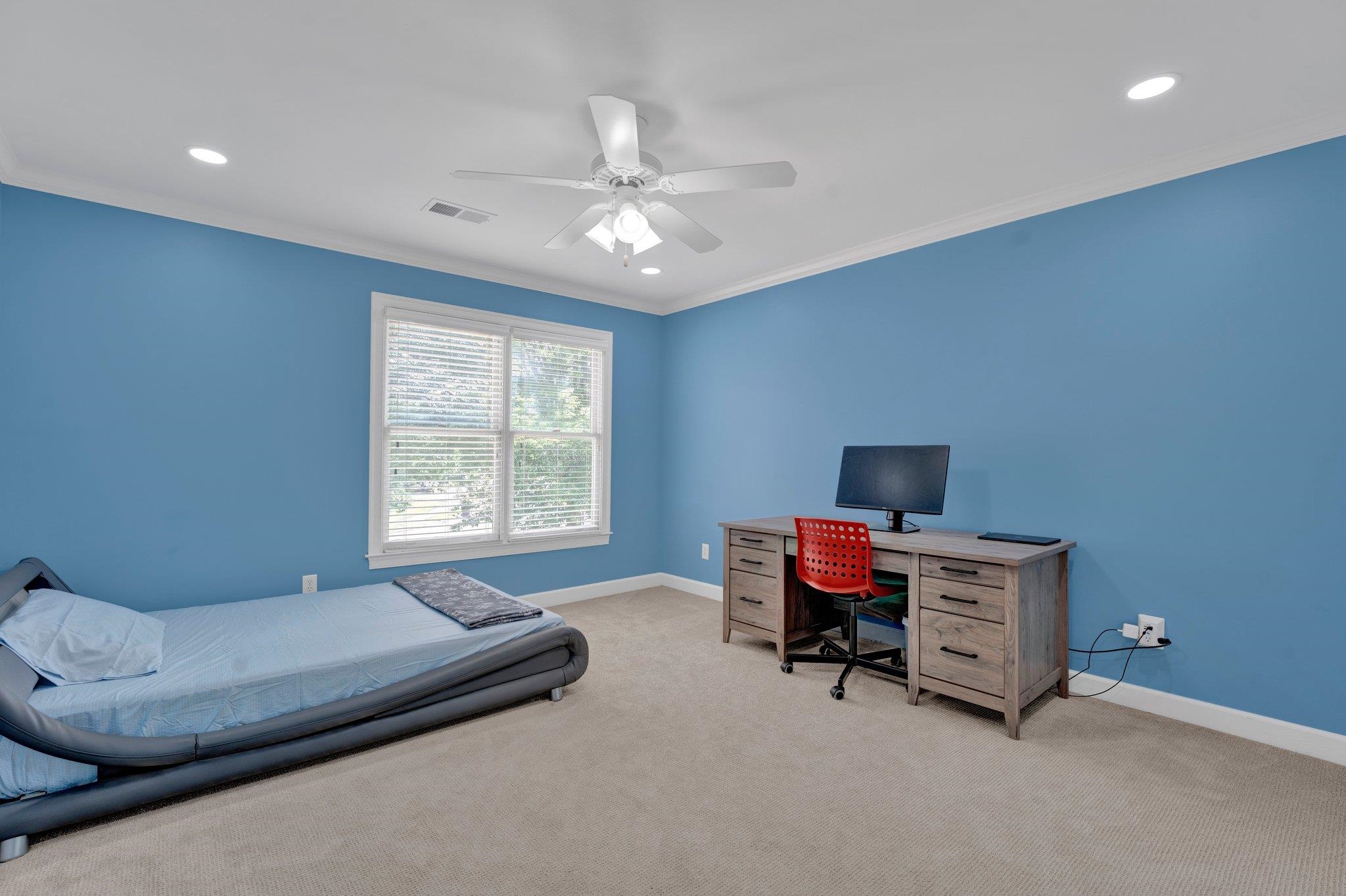 1331 Riding Brook Drive Collierville, TN 38017 - Photo 28 of 39 Carpeted bedroom with crown molding and ceiling fan