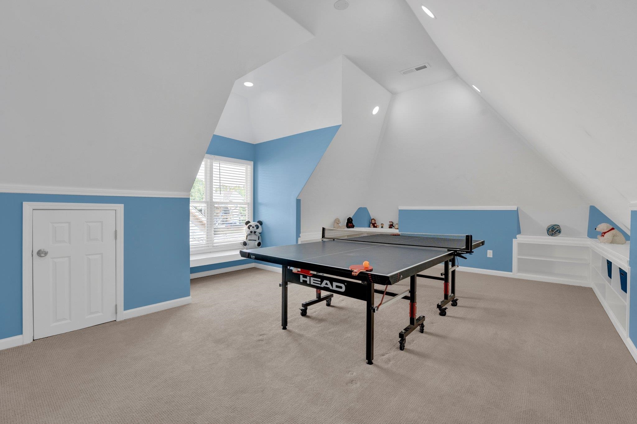 1331 Riding Brook Drive Collierville, TN 38017 - Photo 32 of 39 Recreation room with lofted ceiling and carpet flooring