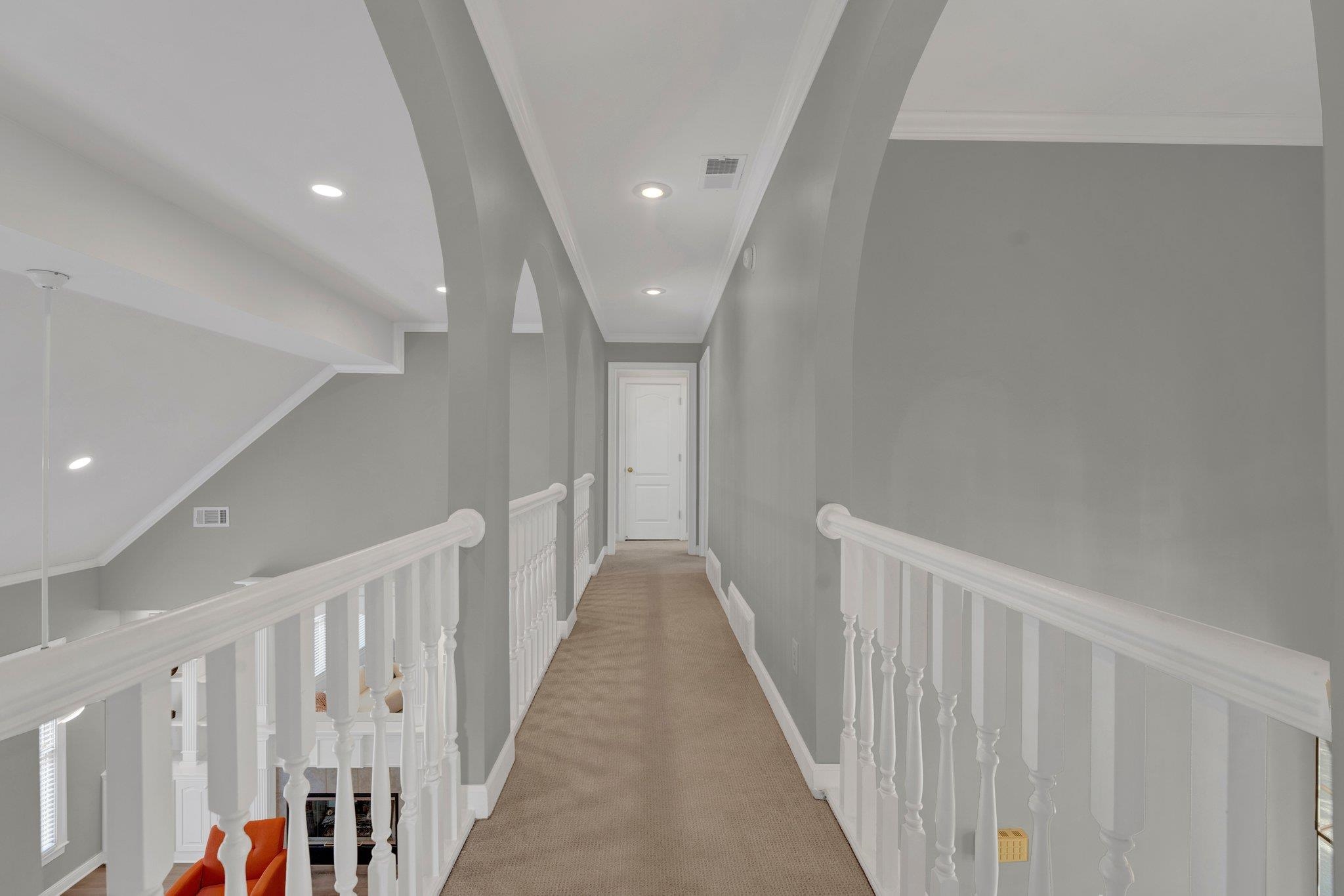 1331 Riding Brook Drive Collierville, TN 38017 - Photo 33 of 39 Hall featuring carpet floors and crown molding