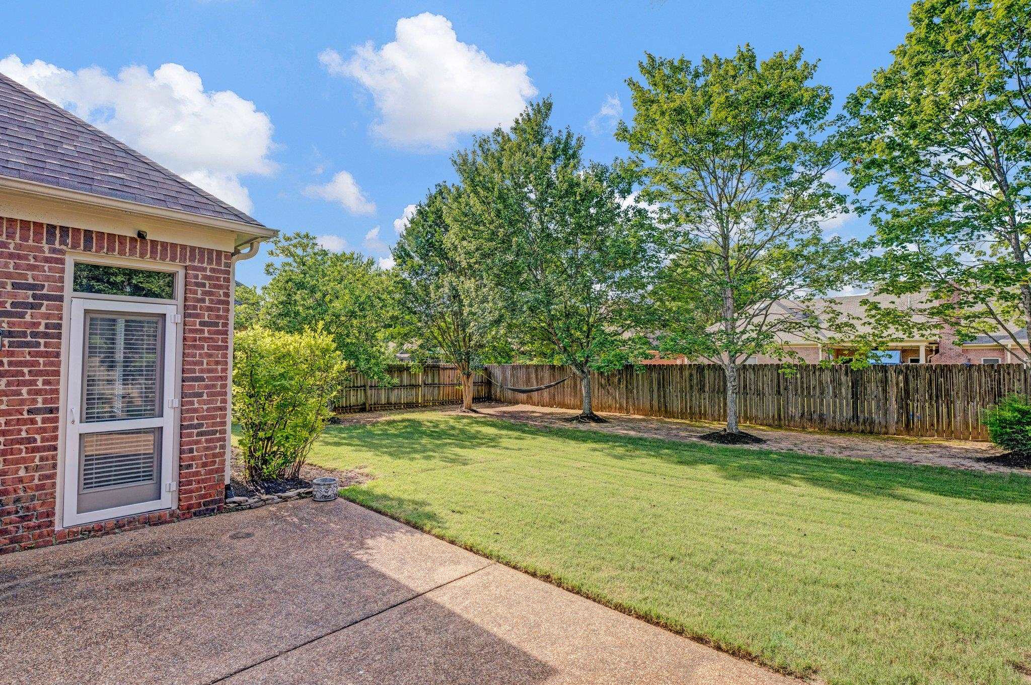 1331 Riding Brook Drive Collierville, TN 38017 - Photo 35 of 39 View of yard with a patio area