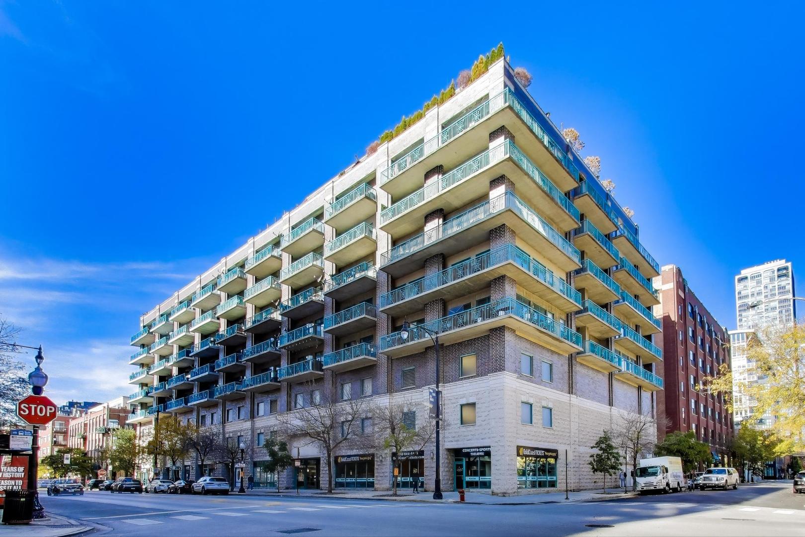 910 West Madison Street, Unit 409 Chicago, IL 60607 - Photo 1 of 14 a view of building with yard