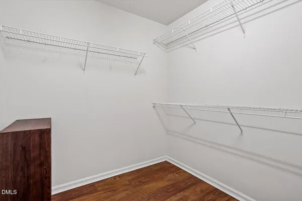 a view of a room with racks on the wall