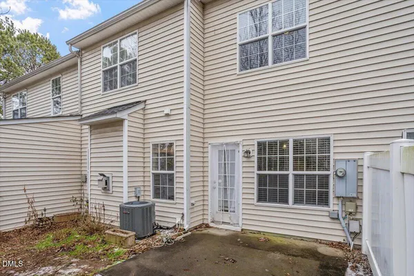 a front view of a house with a garage