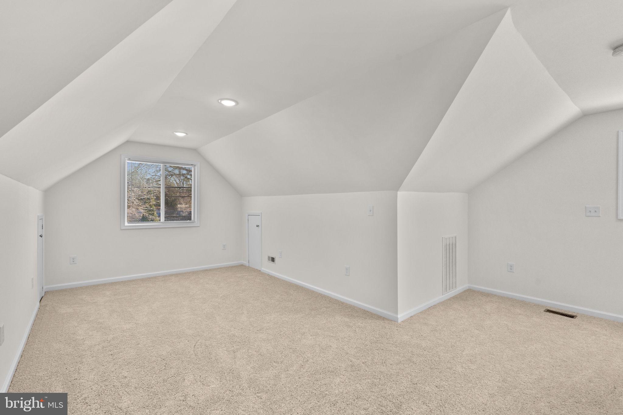 8062 Telegraph Road Severn, MD 21144 - Photo 26 of 45 an empty room with a empty space and windows