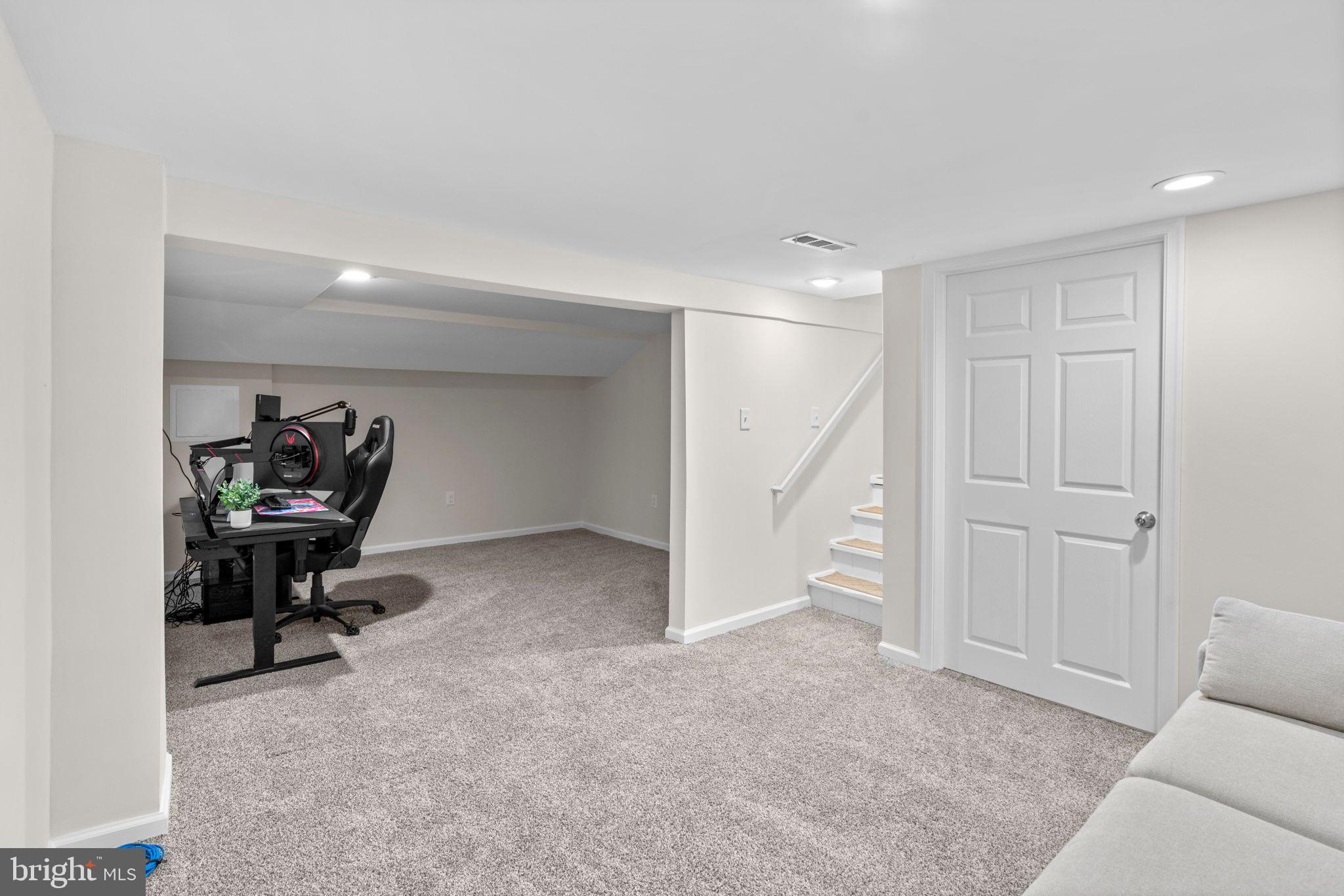 8062 Telegraph Road Severn, MD 21144 - Photo 31 of 45 a view of a hallway with workspace