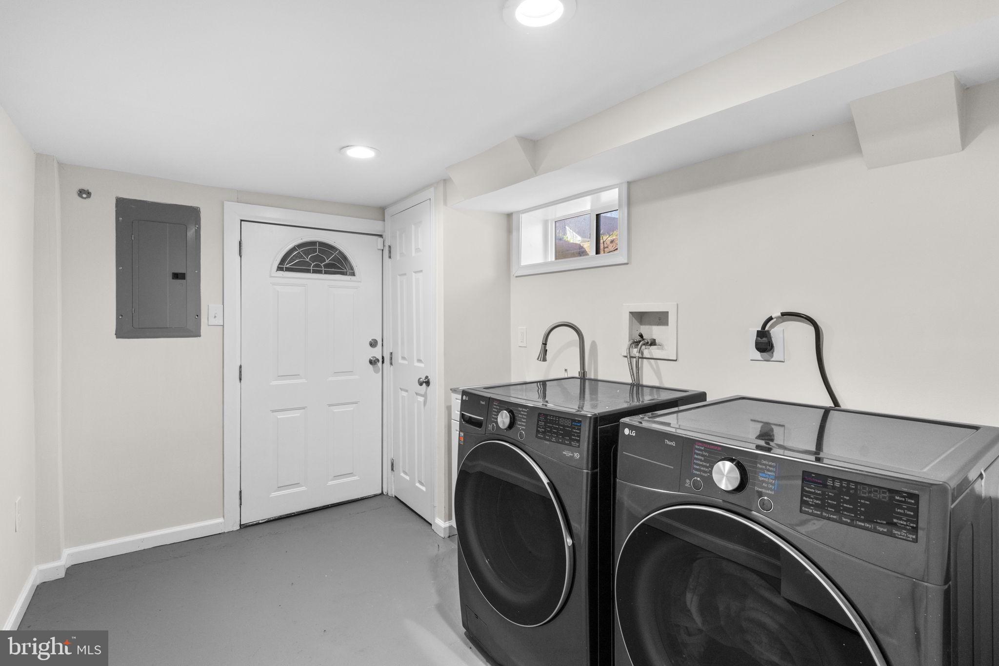 8062 Telegraph Road Severn, MD 21144 - Photo 34 of 45 a view of livingroom with washer and dryer