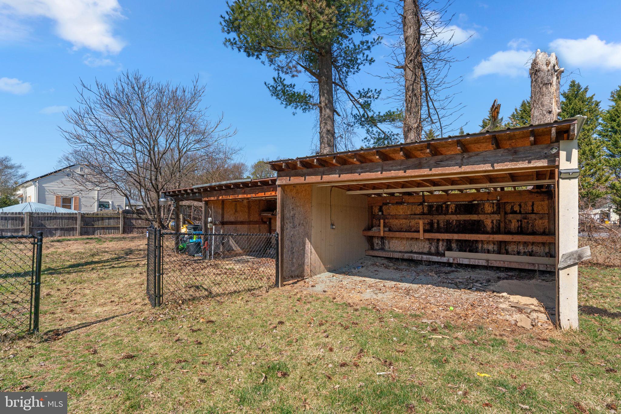 8062 Telegraph Road Severn, MD 21144 - Photo 36 of 45 a view of house with a yard in the background