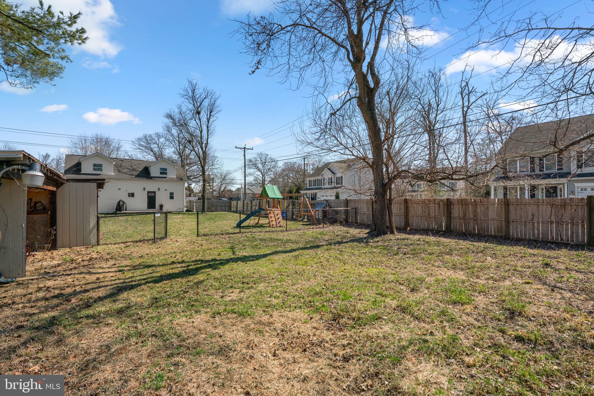 8062 Telegraph Road Severn, MD 21144 - Photo 37 of 45 a view of a yard with a house