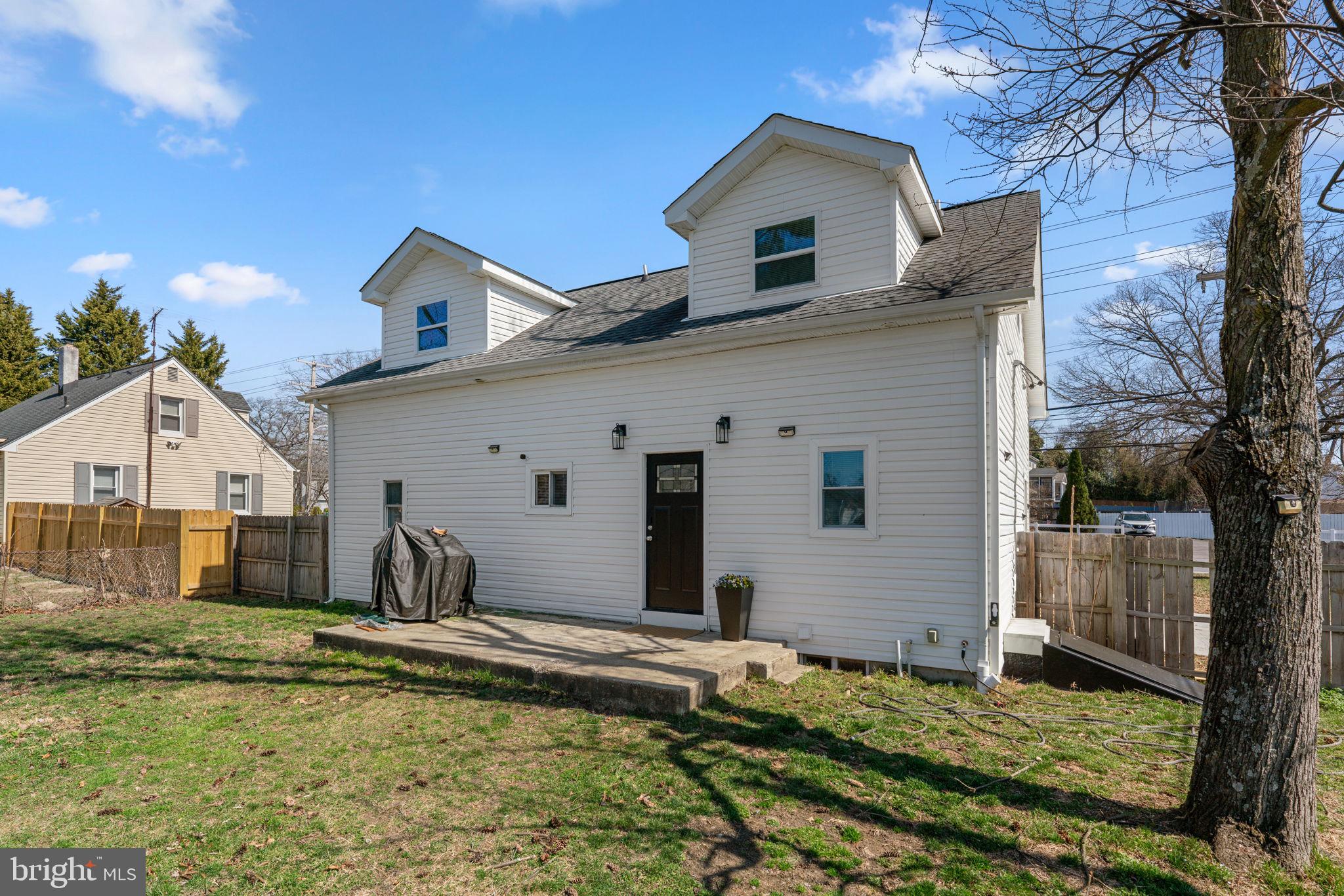 8062 Telegraph Road Severn, MD 21144 - Photo 39 of 45 a view of a house with a yard