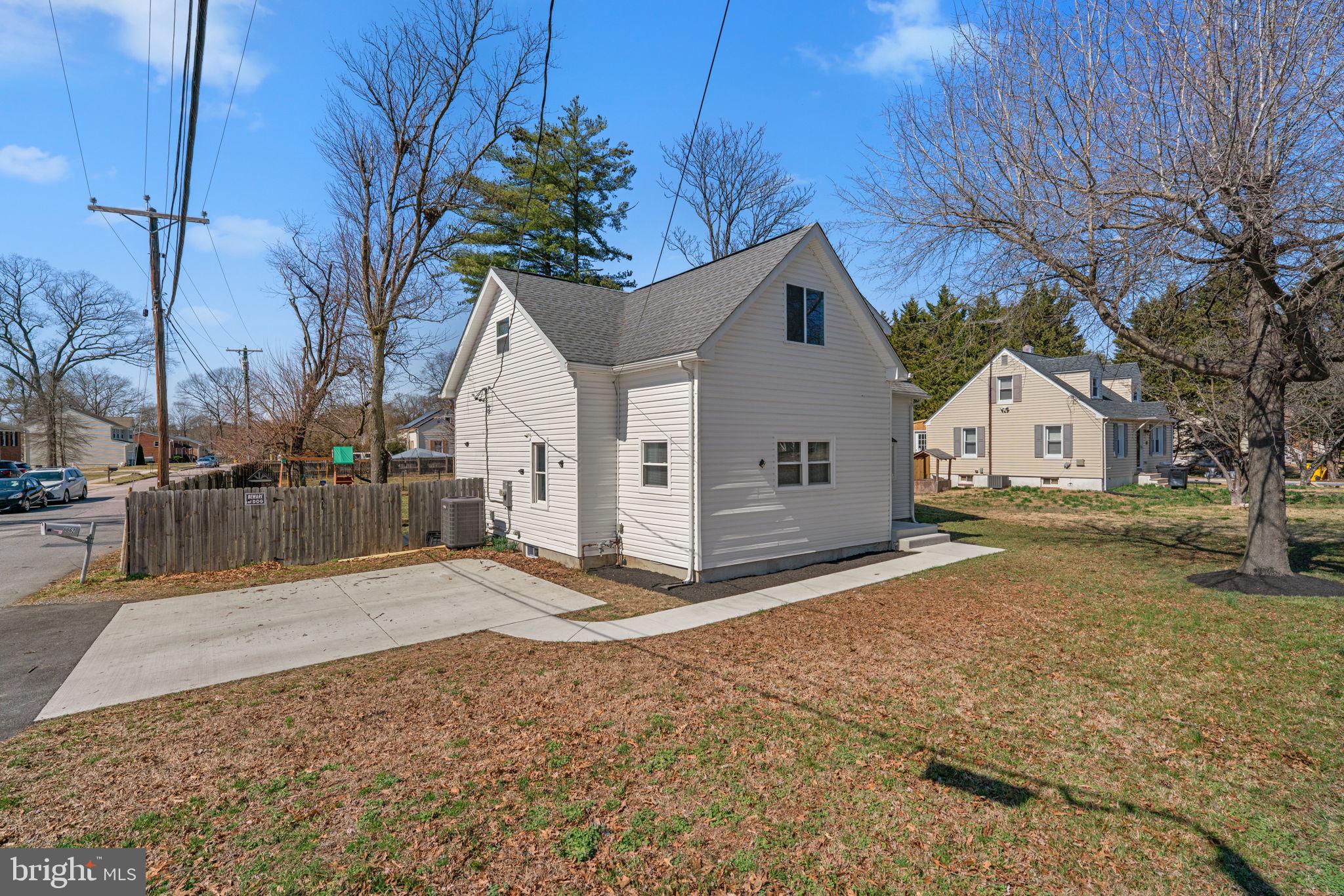 8062 Telegraph Road Severn, MD 21144 - Photo 40 of 45 a view of a house with a yard