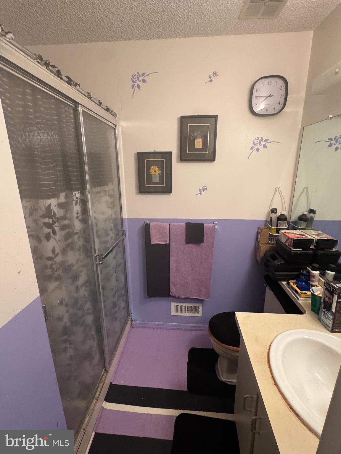 172 Mattix Run Absecon, NJ 08205 - Photo 7 of 9 a bathroom with a sink and a mirror