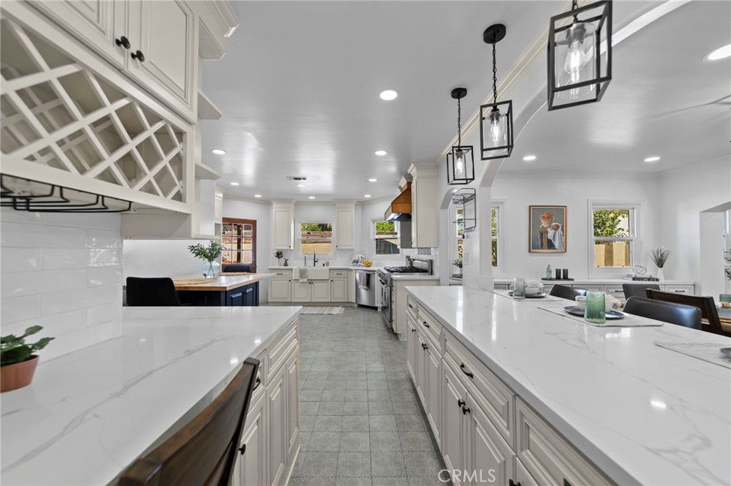 1697 Allen Avenue Pasadena, CA 91104 - Photo 17 of 58 a large white kitchen with lots of counter space