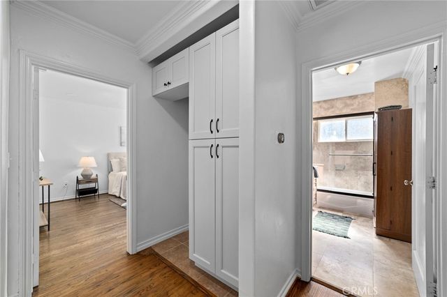 a kitchen with granite countertop a refrigerator and a sink