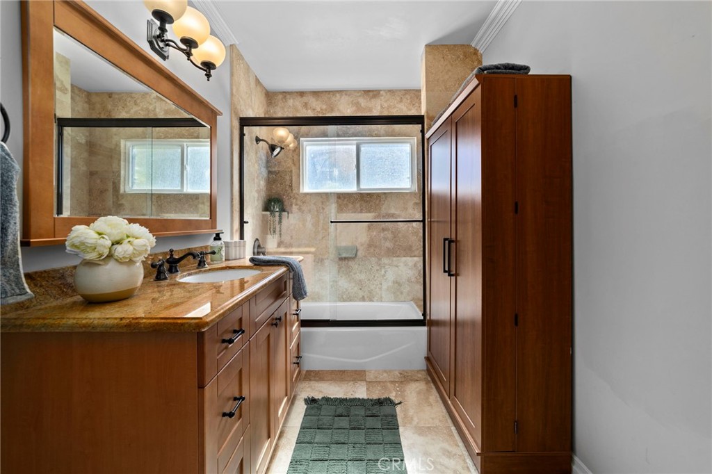 1697 Allen Avenue Pasadena, CA 91104 - Photo 20 of 58 a kitchen with granite countertop a refrigerator and a sink