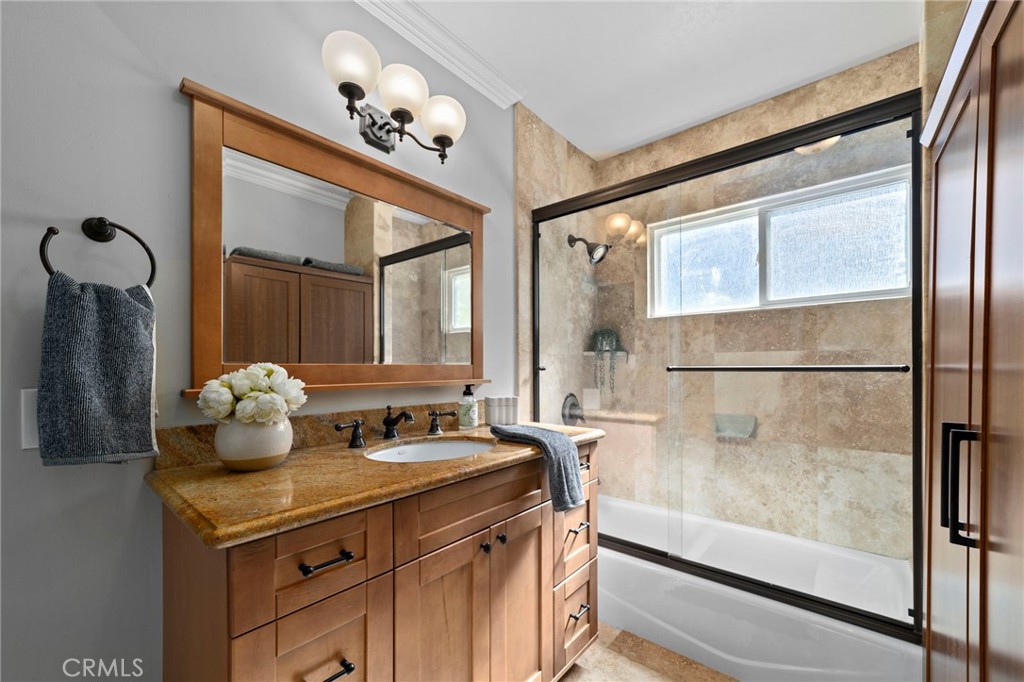 1697 Allen Avenue Pasadena, CA 91104 - Photo 21 of 58 a bathroom with a sink and a mirror