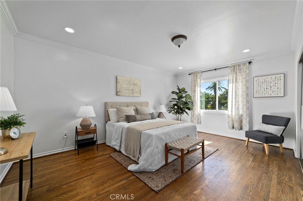 1697 Allen Avenue Pasadena, CA 91104 - Photo 22 of 58 a bedroom with a bed and a window