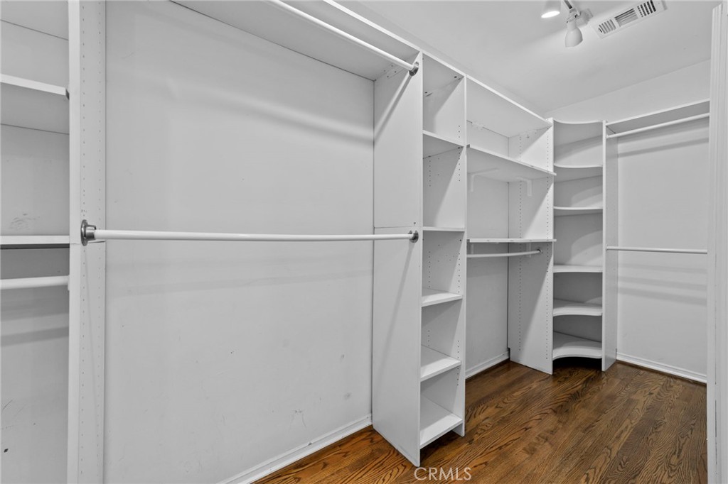 1697 Allen Avenue Pasadena, CA 91104 - Photo 26 of 58 a view of walk in closet with empty racks
