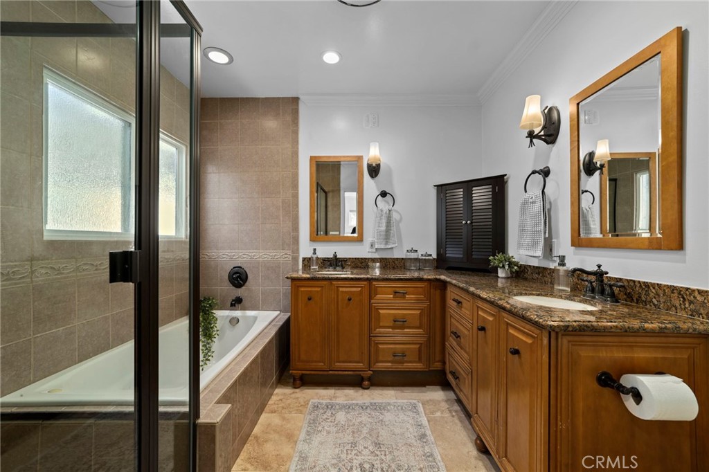 1697 Allen Avenue Pasadena, CA 91104 - Photo 27 of 58 a bathroom with a tub sink and mirror