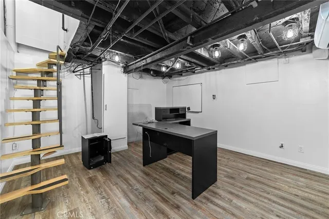 a view of a garden with a building in the background