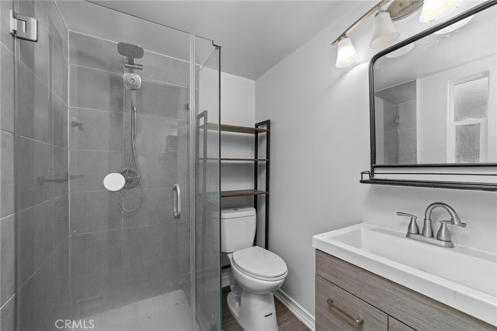1697 Allen Avenue Pasadena, CA 91104 - Photo 35 of 58 a bathroom with a sink toilet and shower