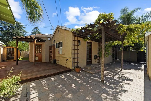 a view of a backyard of the house