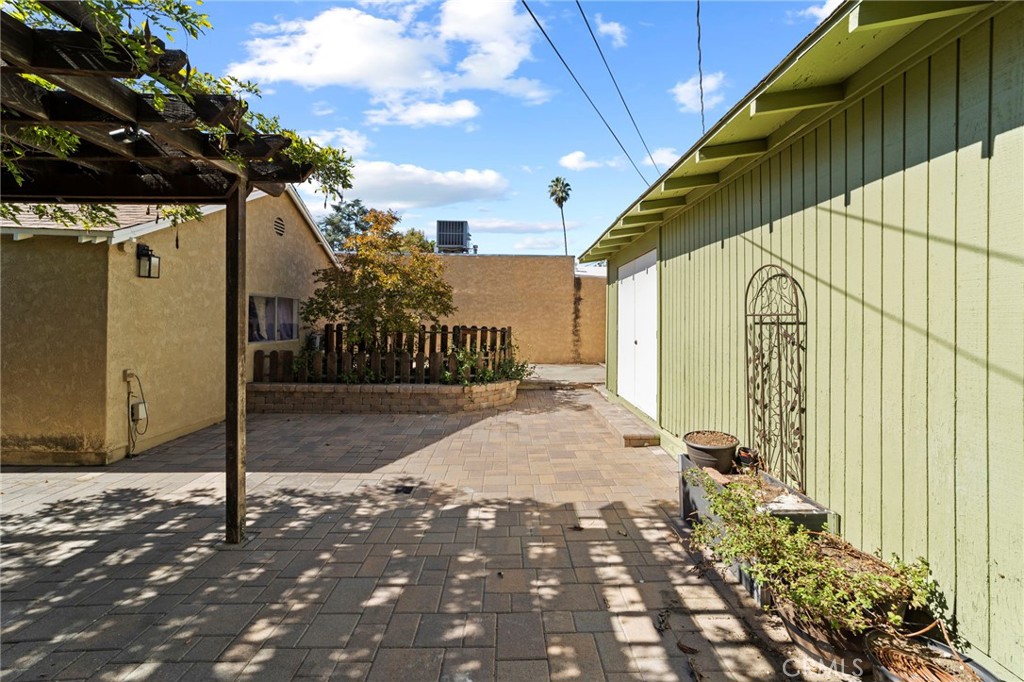 1697 Allen Avenue Pasadena, CA 91104 - Photo 52 of 58 a view of a street with wooden fence