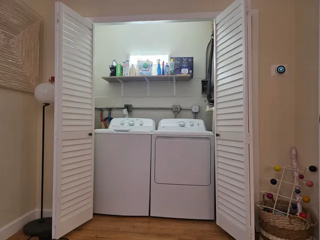 a utility room with dryer and washer