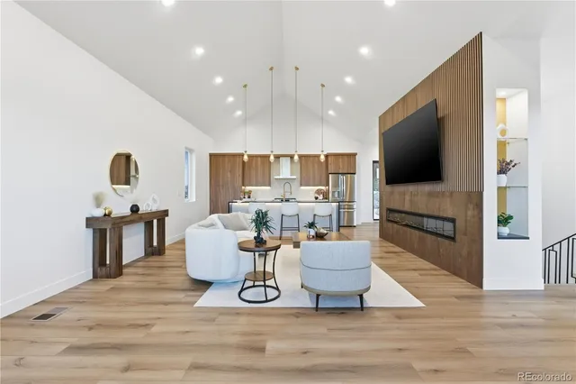 a workspace with furniture and wooden floor