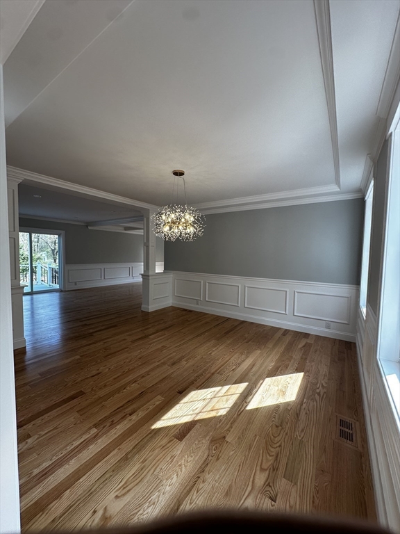 56 Dudley Road Billerica, MA 01821 - Photo 10 of 29 a view of empty room with wooden floor