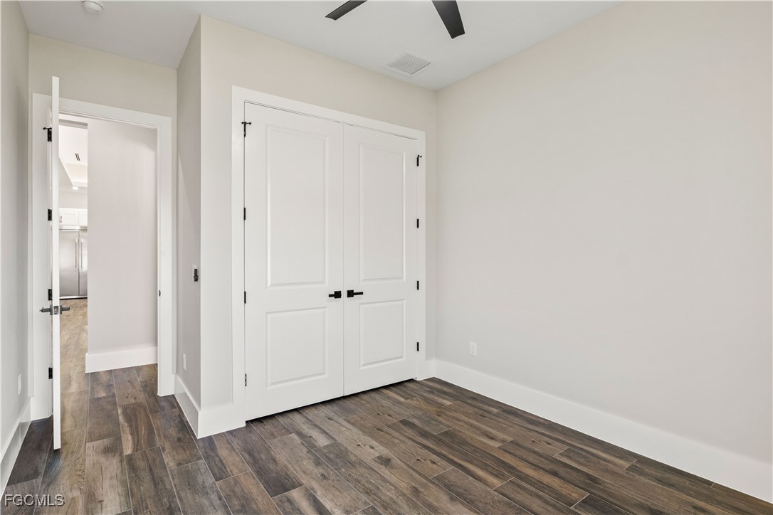3906 Southwest 6th Terrace Cape Coral, FL 33991 - Photo 32 of 50 a view of a room with wooden floor