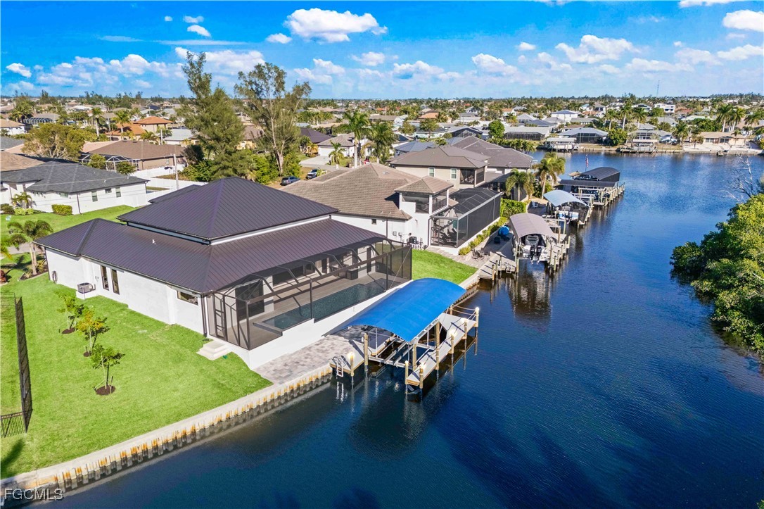 3906 Southwest 6th Terrace Cape Coral, FL 33991 - Photo 4 of 50 an aerial view of a house with a ocean view