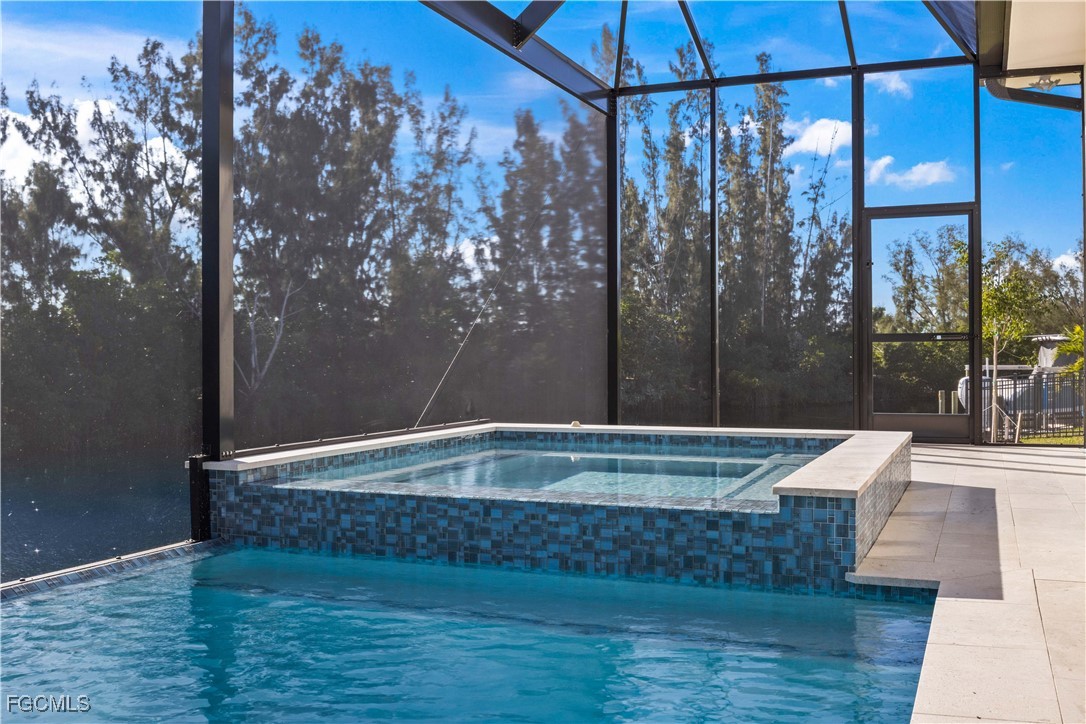 3906 Southwest 6th Terrace Cape Coral, FL 33991 - Photo 45 of 50 a view of outdoor space with swimming pool