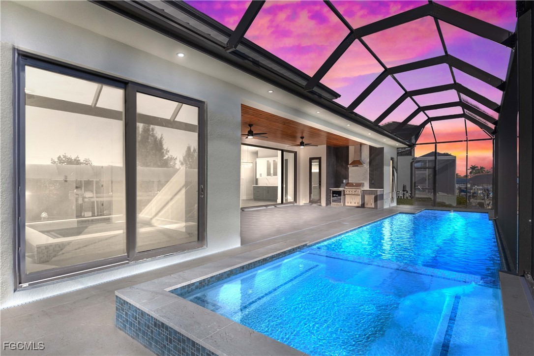 3906 Southwest 6th Terrace Cape Coral, FL 33991 - Photo 6 of 50 a view of swimming pool with seating area